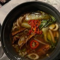 Sticky seitan Ribs in Ramen with udon noodles  at Wagamama - Great Marlborough in London