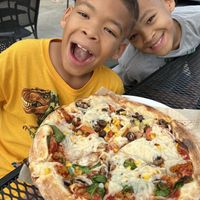 Vegan pizza!!! Mega dough with plant based cheese, plant based meat, chic peas and veggies. Delicious!  at Mod Pizza - Aliana in Richmond