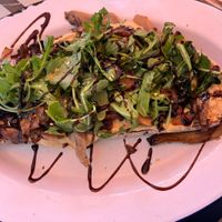 Sourdough bread with hummus, mushrooms and arugula  at Liebling in Vienna