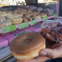 Maple donut $6.00, and blueberry fritter $7.50  at Grumpy Donuts in Camperdown