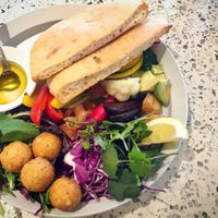 The falafel sandwich, pretty much an assemble your own falafel pitta! Super tasty ! at Cosme Kitchen Adaptation in Osaka