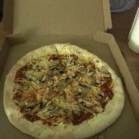 Pizza funghi (vegetarian version substituted wirh vegan cheese) at Domino's Pizza - Pieter Calandlaan in Amsterdam