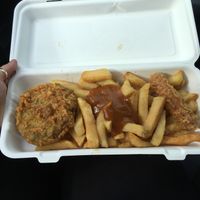 Mushy pea bomb with Linda McCartney sausage, curry sauce and chips   at Capplemans Fish and Chips in Scarborough