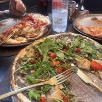We tried 2 vegan pizzas - potato, pepper + onion (left) and mushroom (front)  at Timilia in Palermo