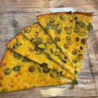 Socca cébettes (with spring onion)  at Chez Pipo in Nice