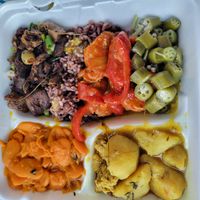 6 options to go, including okra, Ginger chikn, rice and peas, and spicy chikn stew at Shandal's Vegetarian Cafe in Bridgeport