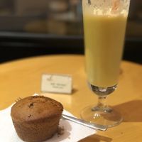 Mango-ginger juice & home made muffin  at Bioteka in Tirana