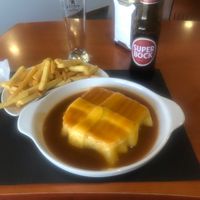 Portuguese Francesina with fries at Spacos in Vila Praia De Ancora
