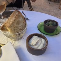 Bread olives and tahini was good but it was not shown on the menu and seemed to be offered as included  at Hambrë  in Ibiza