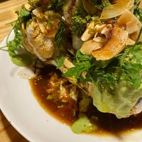 Roasted Cauliflower + vegetables stock + harissa chips at Hambrë  in Ibiza