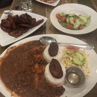 Plantains, cucumber salad, and SPECIAL stew beans  at 11 Hauz in Park City