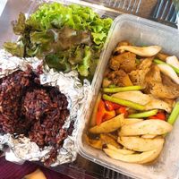 Mushrooms, vegetables & vegetarian duck cooked with Japanese style sauce, black rice, and lettuce at Ohkajhu Organic Restaurant in Bangkok