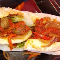 Johnny's meatball sub on a French roll and peach tea, in an almost biodegradable cup at Zunzi's in Savannah