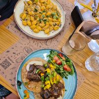 vegan cheese-mushroom gnocchi and vegan jackfruit-mushroom pancakes  at Rubik's Superfood & Coffee in Patras