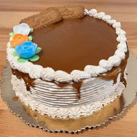 Caramel and lotus birthday gateaux! Filled with layers of lovely buttercream   at Pasteleria Serra in Gandia