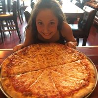 Enjoying a New York pizza  at Joe Pesto's in Squamish