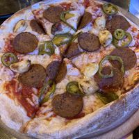 Vegan pepperoni pizza with jalapeños and garlic at G's Pizza - Howard Ave in New Orleans