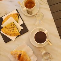 coffe, spinach panini, apricot croissant, hot chocolate at Antico Caffe Scaletto in Bologna