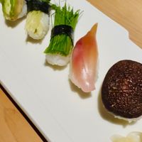 I love here because a sushi chef provides artistic and delicious sushi as always 😊Shiitake, Japanese ginger, green onion sprouts, Daikon radish sprouts, avocado, okra. at Gonpachi - Shibuya in Tokyo