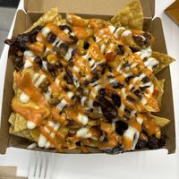 BBQ Chick’n Nachos (a freebie since I came right after a restaurant photo shoot 🩷)  at Unburger Grill in Dearborn