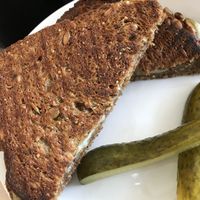 Grilled Cheese
Vegan Havarti, seedy bread. With pickles. 
Yummy. Will pair nicely with upcoming soups!  at Sweet Pea Cafe & Playhouse in Edmonton