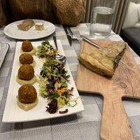 Walnut balls and pie of the day (leek vegan) at Valia Calda in Kalampaka