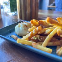 Chips with penang curry sauce at Yulli's Brews in Alexandria