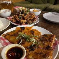 Kimchi pancake and fried mushrooms in the back  at Yulli's Brews in Alexandria