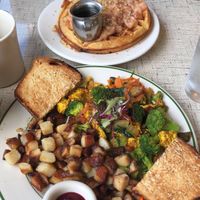 Vegan waffle special with amazing peaches and the tofu scramble   at Swan Street Diner in Buffalo