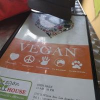 front of menu at The Vegan House in Hollywood