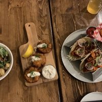 Caesar salad, crab cakes and tacos with tots!  at Renegade Kitchen & Craft Bar in Kelowna
