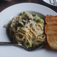 Creamy mushroom pasta with extra brocoli at Roadhouse Cafe & Nom Yum Delivery in New Delhi
