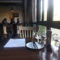 Table at Roadhouse Cafe & Nom Yum Delivery in New Delhi