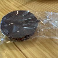 Alfajor (Latin American chocolate-coated almond-based cookie filled with vegan dulce de leche)  at Papas Elvira in Granada