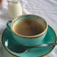 this small pot of oat milk was for our 2 coffees. at Salt Shack Cafe in Hayling Island
