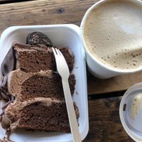 Chocolate cake with oat latte  at The Coffee Station in Taunton