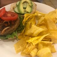 Homemade vegi-burger with plantain chips. at Lúcuma in Guadalajara