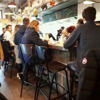 Where you order and pick up your food at Miznon in Vienna