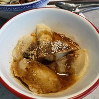 Potato-filled dumplings with spicy sesame sauce   at Cai Kitchen in Hamburg