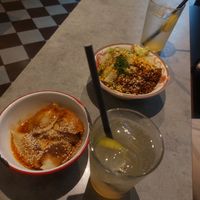 potato filled dumplings and dan dan noodles at Cai Kitchen in Hamburg