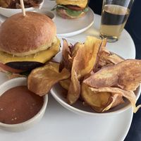 Vegan burger with side of crisps  at Comoba in Lisbon