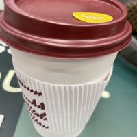 Soya latte with sticker  at Pret A Manger - Tavistock Square in London