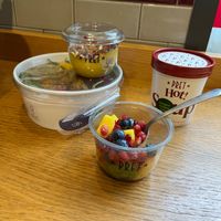 Fruit cup, soup, a grain bowl, and a little dessert bowl.  at Pret A Manger - Fitzrovia in London