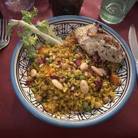 Magluba (rice, carrots, peas, potatoes, almonds, raisins, chickpeas) with amazing side of hummus  at Frary's in Venice