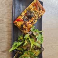Focaccia with aubergine tomato and vegan cheese at Amour Patisserie Vegetale in Nice