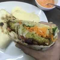 Vegan mega falafel with lots of veggies, hummus, fresh house made pita and tomato sauce! Soo so good and only 10 sols!  at Green Falafel in Cusco