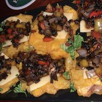 Plantain Pizza Medallions. at Cuba's Cookin' in Oranjestad