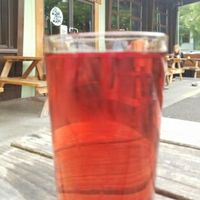 outside with a cider at The Bye and Bye in Portland