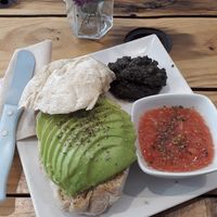 Mollete with tapenade, tomate and avocado at Almazen Cafe in Sevilla