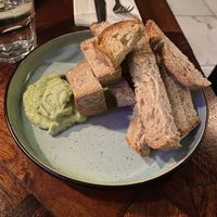 Bread with a whipped parsley flavoured dip   at The Black Pig with White Pearls in North London